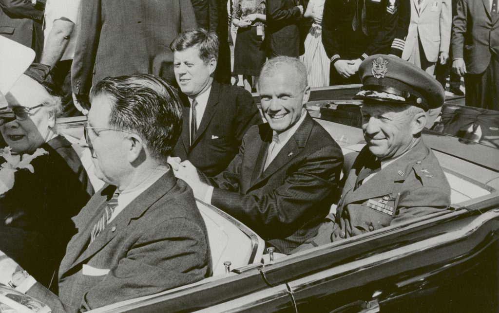 President John F. Kennedy (left), John Glenn and General Leighton I. Davis ride together during a parade in Cocoa Beach, Florida after Glenn’s historic first U.S. human orbital spacefight.
