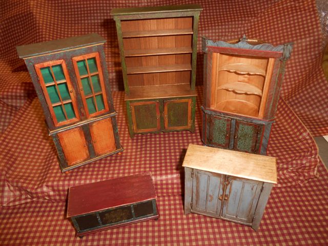 Several Miniature Chest of Drawers